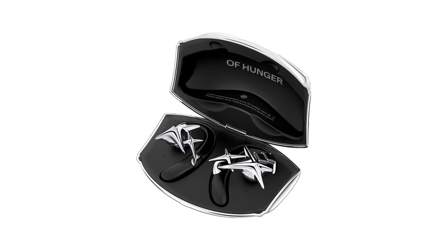 Open OF HUNGER NEBULA charging case with sculptural open-ear accessory earphones on a clean white background.