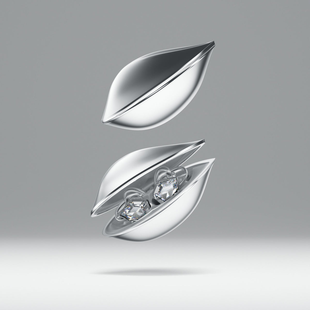 OF HUNGER Electronic Gems earphones in a silver leaf-shaped charging case