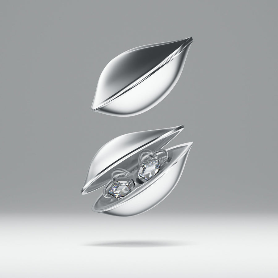 OF HUNGER Electronic Gems earphones in a silver leaf-shaped charging case