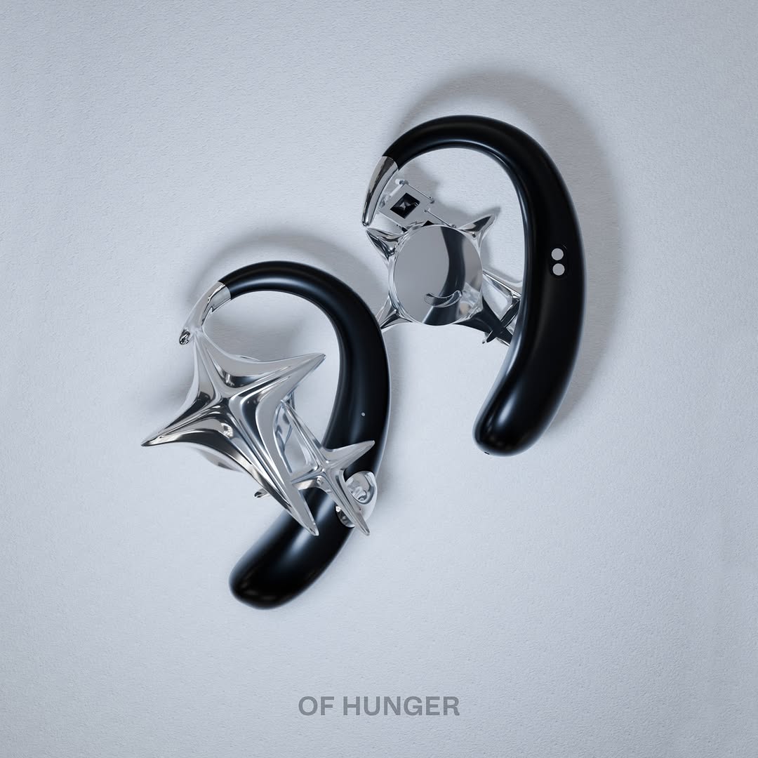 Black open-ear accessory earphones with silver star and circular ornaments