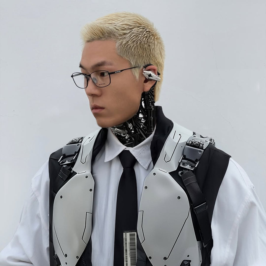 Swaggydoug wearing glasses, a tie, protective vest and a silver ear device
