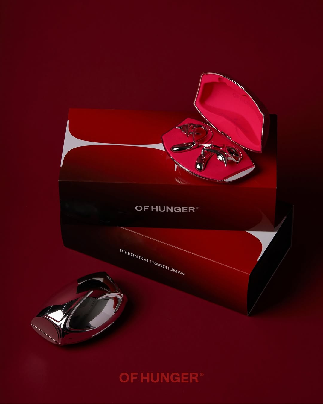 Red OF HUNGER New Year boxes with silver accessory earphones and case