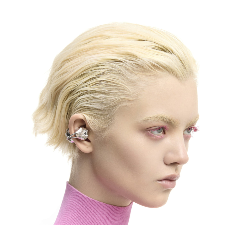 Model wearing OF HUNGER Electronic Gems White Zircon earphones as a visible statement accessory