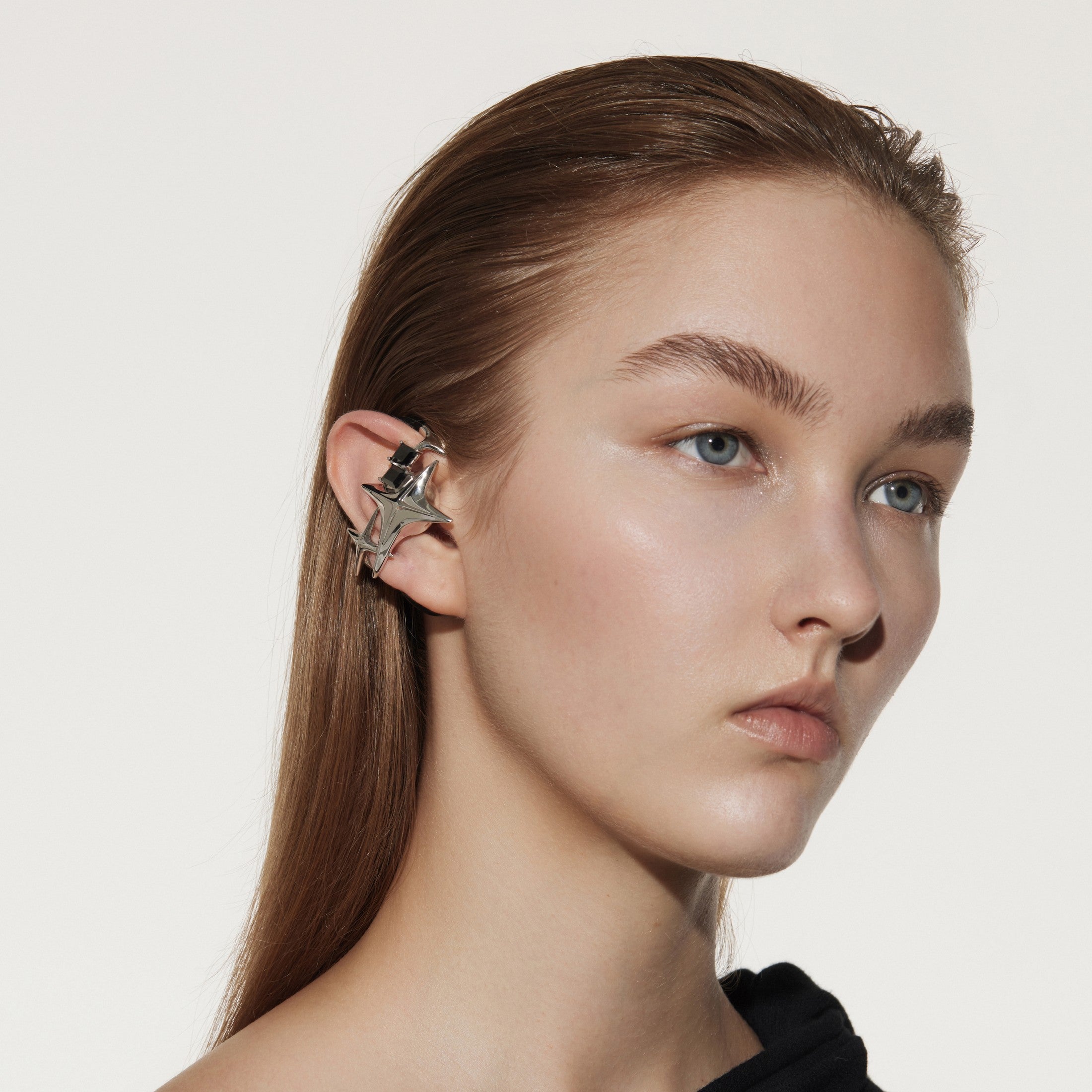 OF HUNGER NEBULA earphones on ear with an organic sculptural form