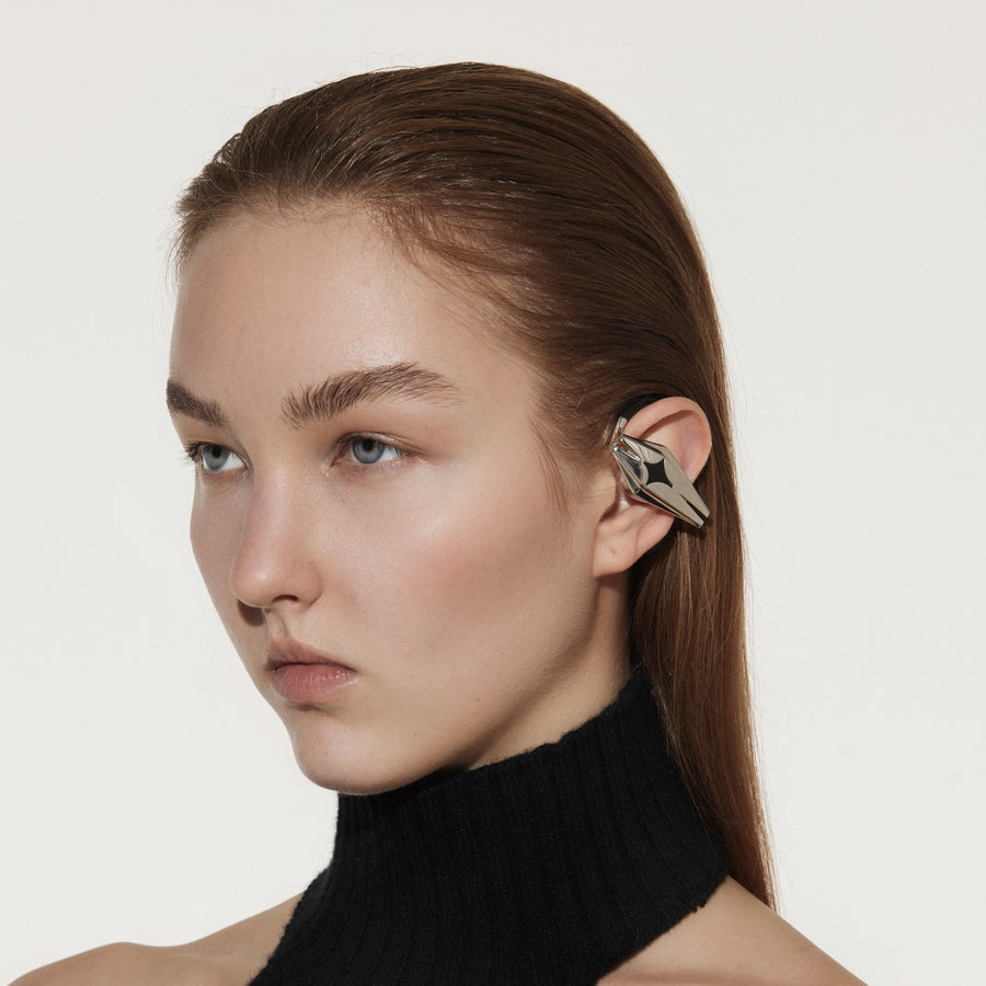 OF HUNGER Starship earphones with a cinematic space-age accessory silhouette