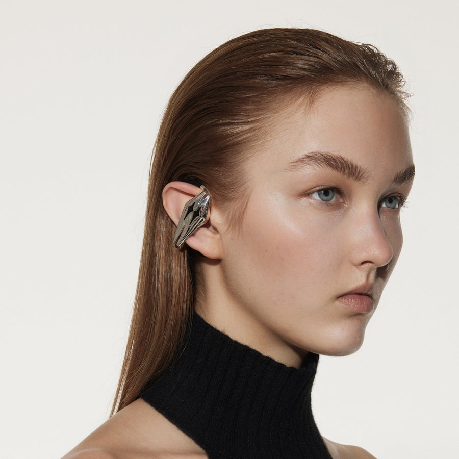 OF HUNGER Starship earphones styled on a model for an international fashion-tech look