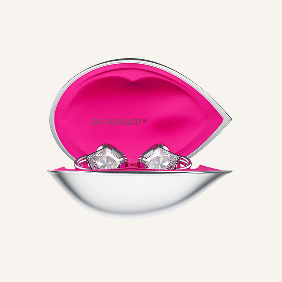 Open OF HUNGER Electronic Gems charging case presented as a giftable jewelry-tech object