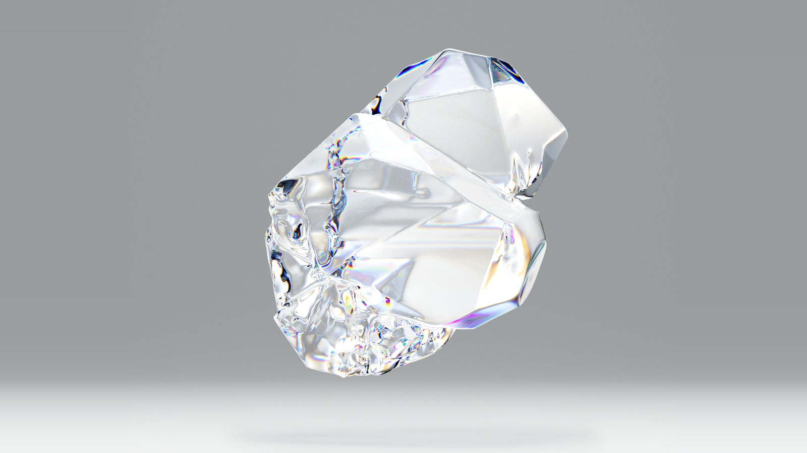 Clear zircon-inspired crystal floating against a soft gray background