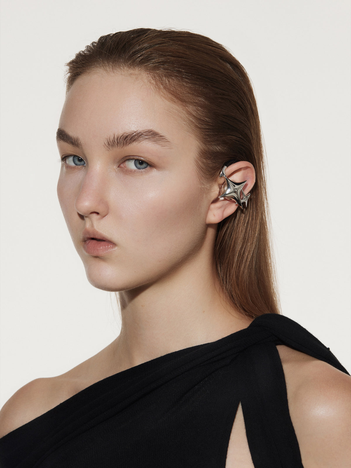 Model wearing the NEBULA ear accessory